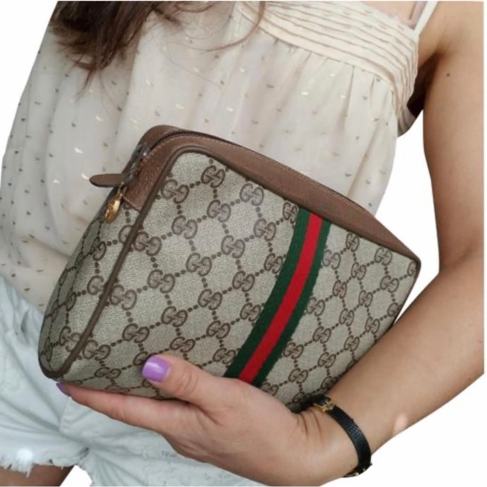 Authentic Gucci vintage web sherry line clutch bag 89.01.012